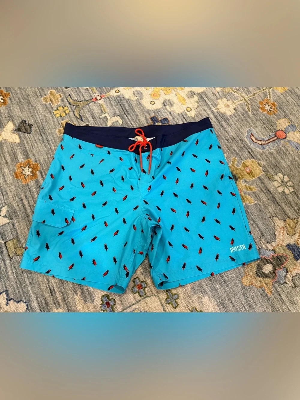 Duluth Trading Co. Men's Bull Moose parrot print board shorts in blue size 46